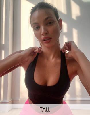 Asos Design 4505 Icon Seamless Sports Bra With Lattice Back Detail-black In Black
