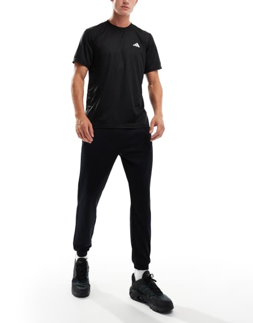 ASOS 4505 tapered thermal fleece lined running joggers with zip pockets in black ASOS