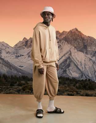 brown sweatpants and sweatshirts