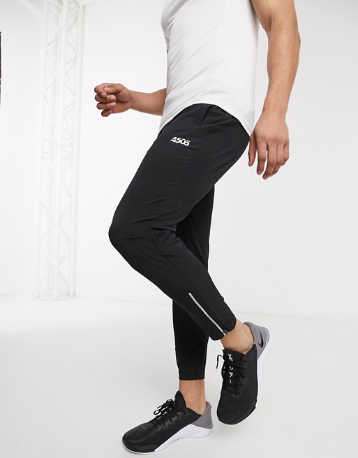 ASOS 4505 icon woven skinny tapered running joggers with reflective zip detail in black