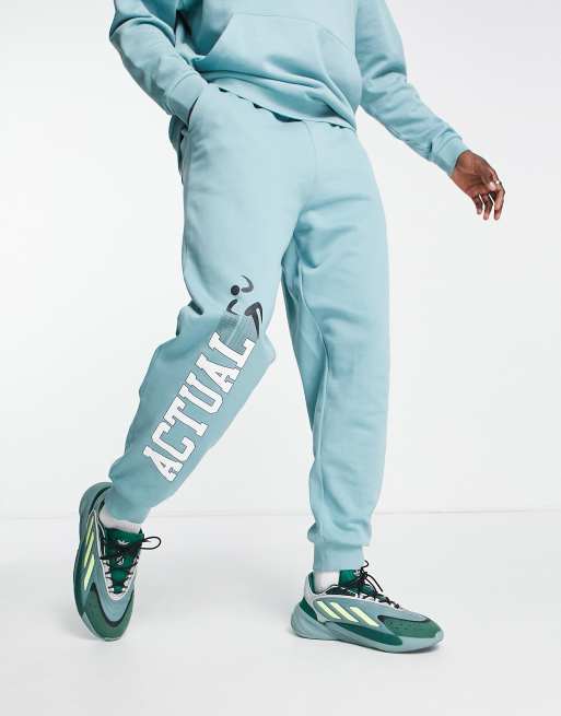 ASOS Actual - Afslappede joggingbukser med grafisk logoprint i blå - Del af sæt