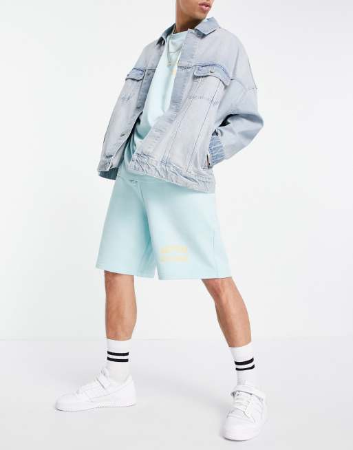 ASOS Actual Athleisure co-ord relaxed shorts with logo print in canal blue