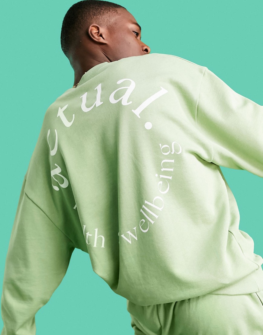 ASOS Actual Athleisure oversized sweatshirt in green with health and wellbeing logo large back print