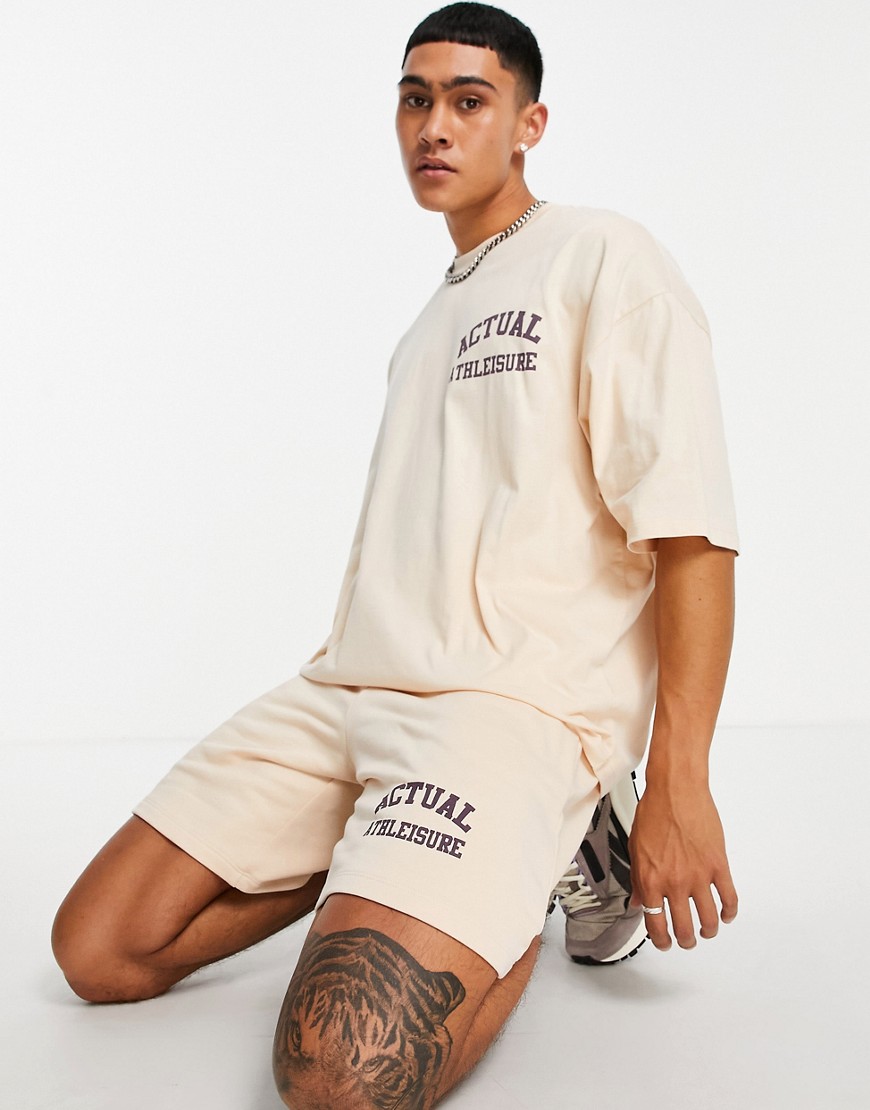 ASOS Actual Athleisure relaxed shorts with logo print in sand - part of a set-Neutral