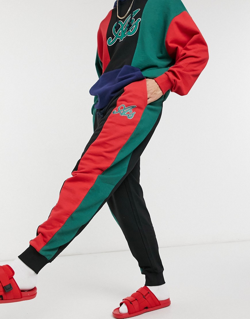 ASOS Actual co-ord oversized jogger in black with green and red colourblock cut and sew