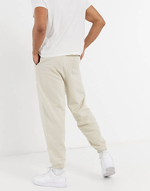 Men co-ord relaxed joggers in beige with script print 