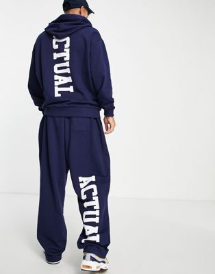 ASOS Actual relaxed sweatpants with back leg logo print and printed drawcords in blue - part of a set - ASOS Price Checker