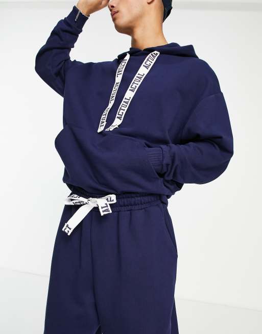 ASOS Actual co-ord relaxed joggers with back leg logo print and printed drawcords in blue, 3 of 4