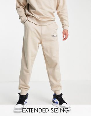 ASOS Actual co-ord relaxed joggers with logo print in neutral - ASOS Price Checker