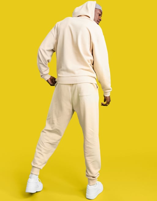 ASOS Actual co-ord relaxed trackies with logo print in beige, 2 of 4