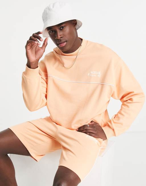 ASOS Actual health and wellbeing set with logo puff prints and piping ...