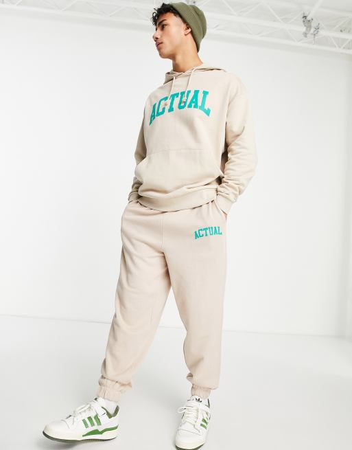ASOS – Actual – Oversize-Jogginghose in Beige mit Logoprint