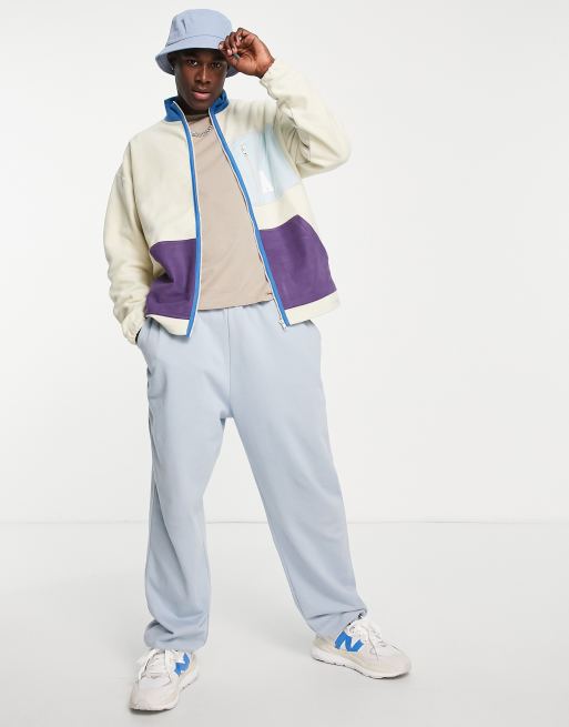 ASOS Actual – Oversize-Trainingsjacke aus Polarfleece in Ecru mit Farbblockdesign, durchgehendem Reißverschluss, Taschen und Kragen