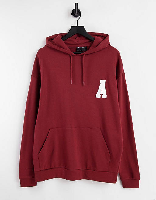 ASOS Actual oversized hoodie in burgundy with varisty logo print