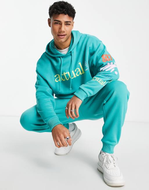 ASOS Actual oversized hoodie with actual club multi prints in green part of a set