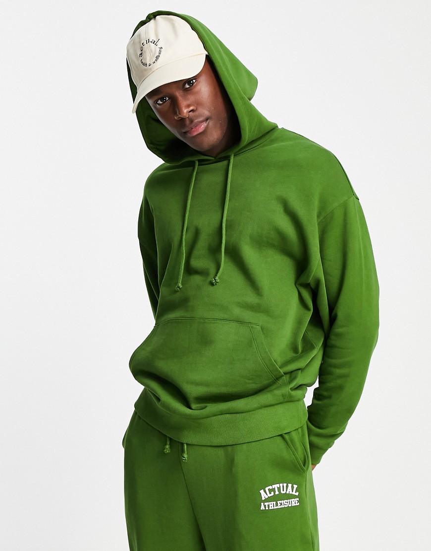 ASOS Actual oversized hoodie with athleisure back logo print in green -set