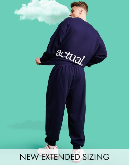 ASOS Actual oversized  joggers in navy with logo print