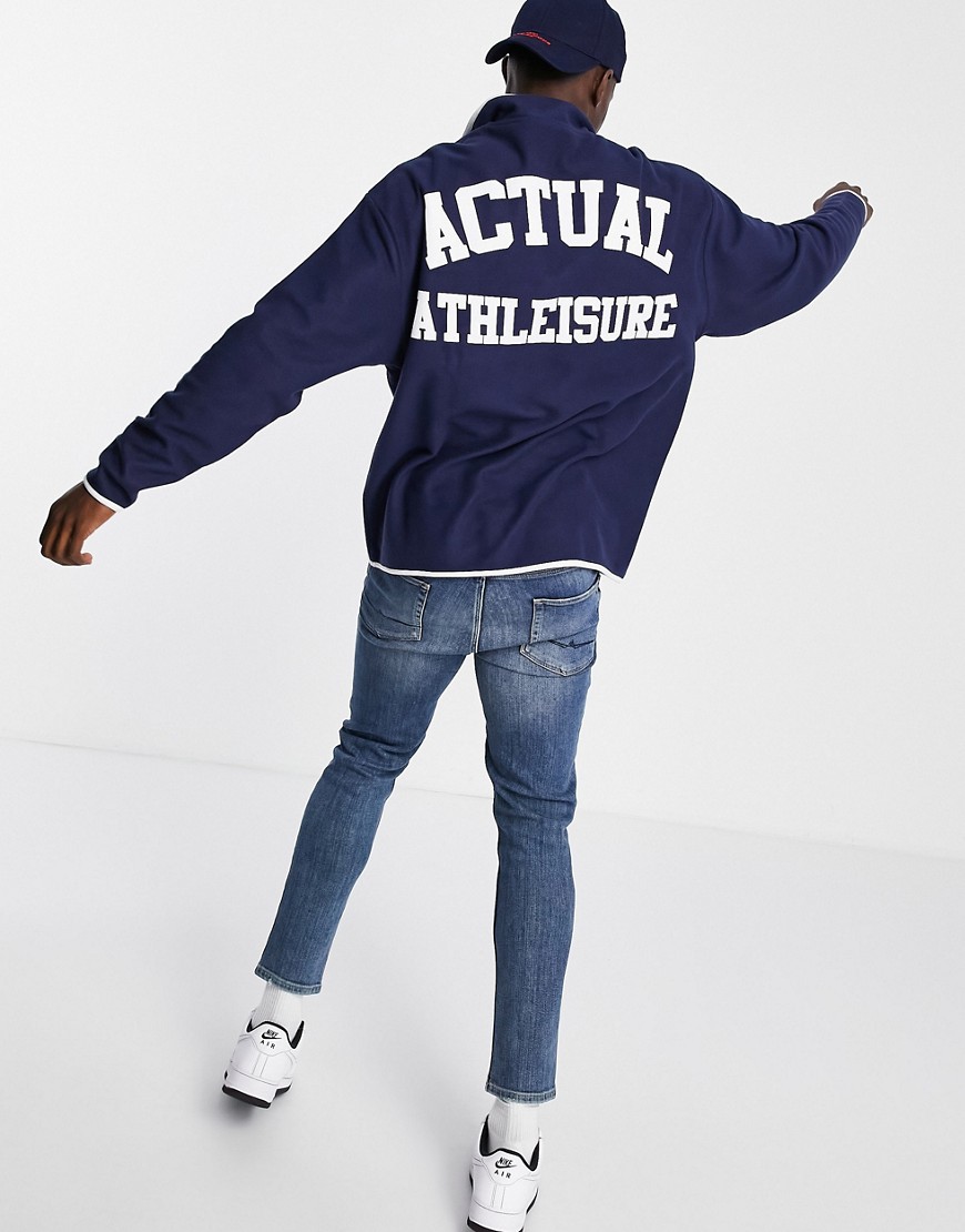 ASOS Actual oversized polar fleece sweatshirt with snaps fastening with chest and back print in navy