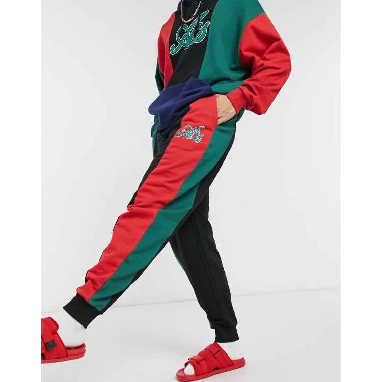 ASOS Actual oversized sweatpants set in black with green and red colorblock cut and sew ASOS