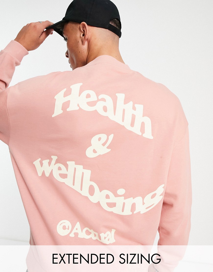 ASOS Actual oversized sweatshirt with health and wellbeing logo back print in pink