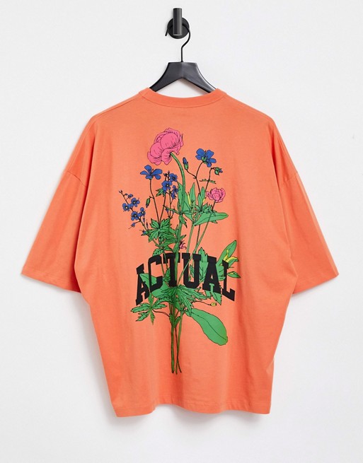 ASOS Actual oversized t-shirt in orange wash with floral logo front and back print