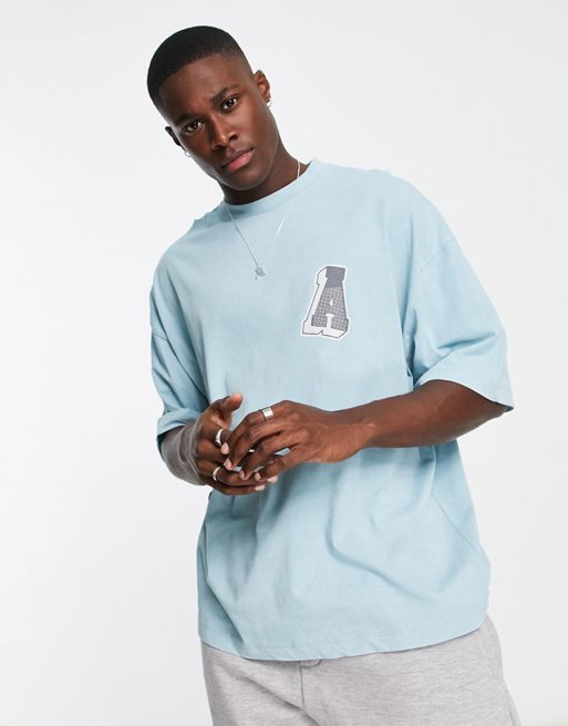 ASOS Actual oversized T-shirt with vintage sports graphic in neutral