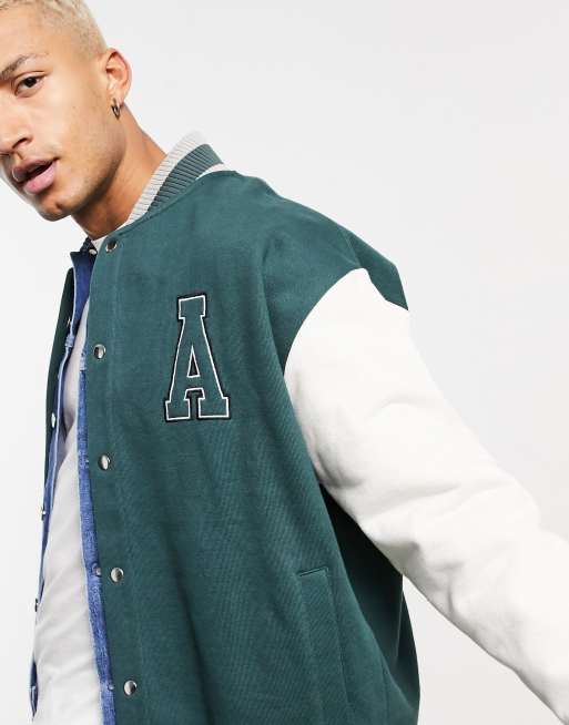 ASOS DESIGN oversized varsity jacket with real leather sleeves in green