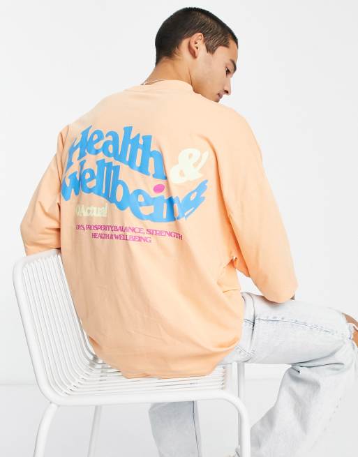 ASOS Actual – Pomarańczowy T-shirt oversize z napisem „Health and Wellbeing“ na plecach i logo