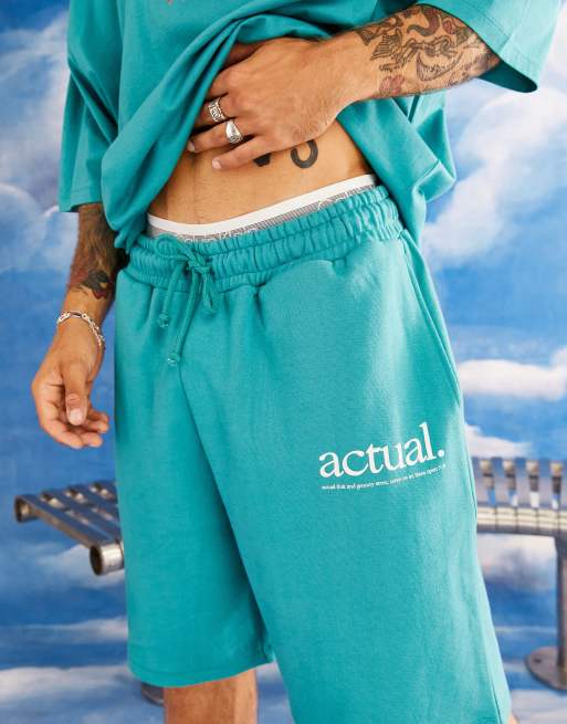 ASOS Actual relaxed shorts with health and well-being print in green (part of a set)