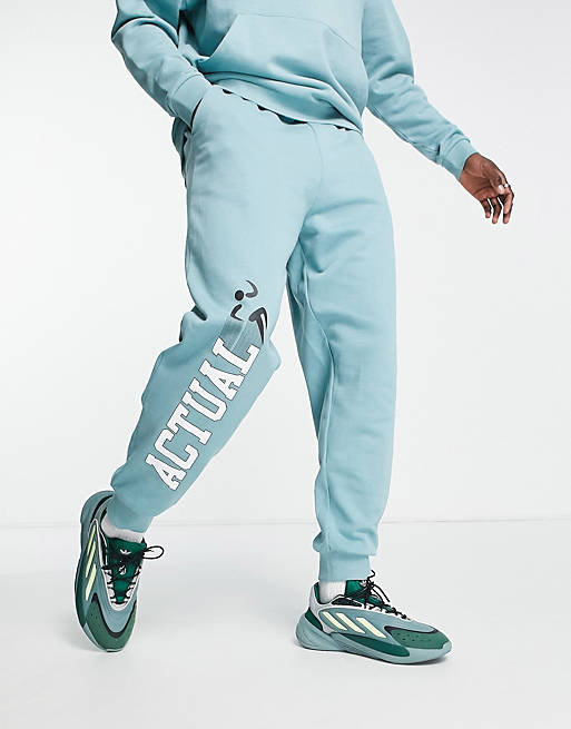 part of a set Asos Men Sport & Swimwear Sportswear Sports Pants ASOS Actual relaxed sweatpants with graphic logo print in 