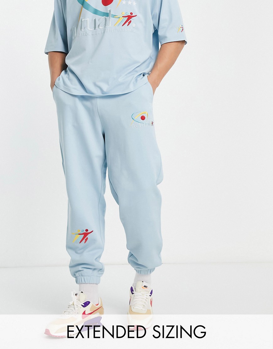 ASOS Actual relaxed sweatpants with running graphic print in blue - part of a set