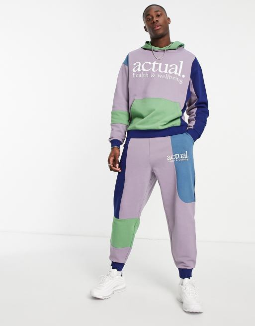 ASOS Actual relaxed trackies with colourblocking and logo print in purple (part of a set)