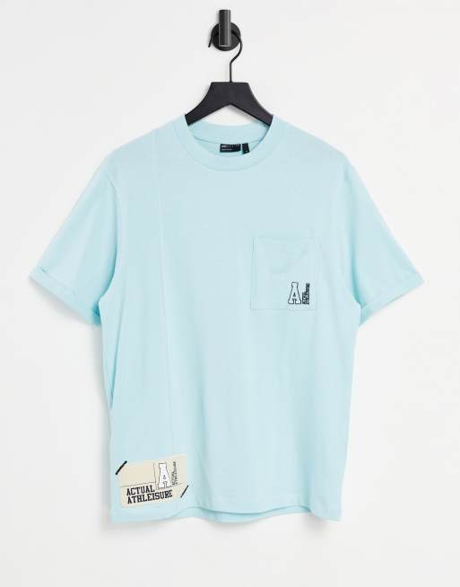 ASOS Actual t-shirt with cut and sew panelling chest pocket with lgoo woven patches in blue