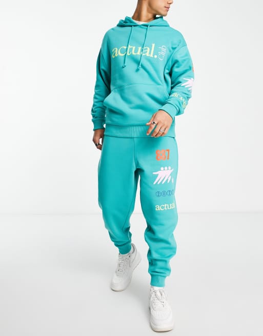 ASOS Actual – Zielone luźne joggersy z kolorowymi wzorami, część zestawu