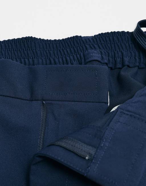 ASOS ADAPTIVE avslappnade avsmalnande kostymbyxor i marinblått, 9 av 9