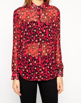 red and black animal print blouse