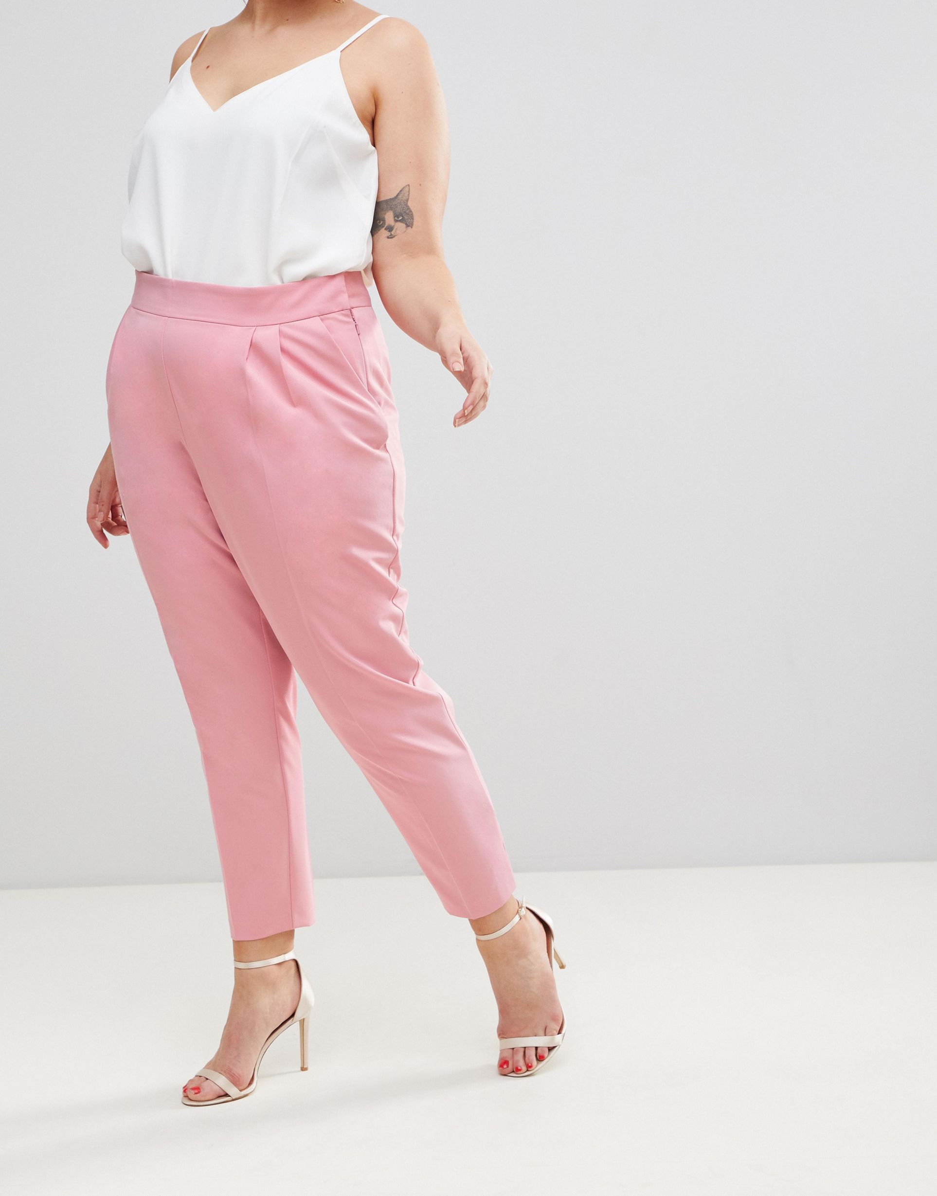 Розовые брюки для полных