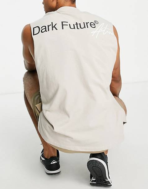 T-shirt senza maniche oversize bianca con scritta "Fake" sul retro Asos Uomo Abbigliamento Top e t-shirt T-shirt T-shirt senza maniche 