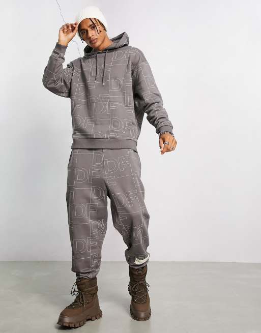 ASOS Dark Future co ord oversized hoodie with all over logo print in dark grey