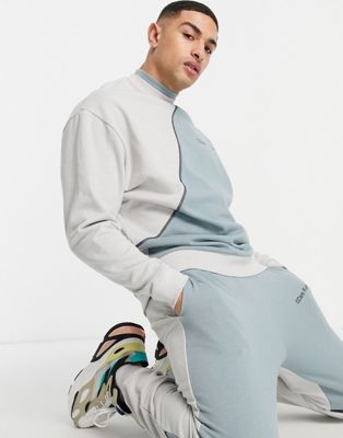 ASOS Dark Future co-ord relaxed jogger with curved cut and sew details and logo print in grey