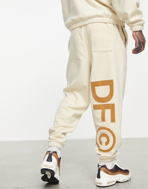 Asos Dark Future Co Ord Relaxed Joggers In Polar Fleece With Logo