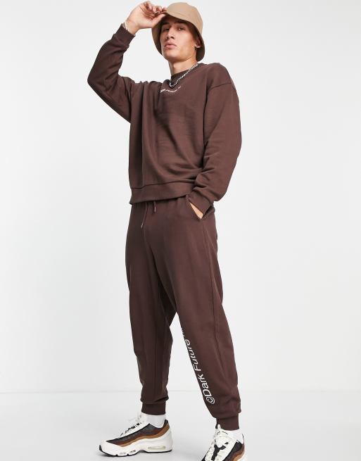 ASOS Dark Future co-ord relaxed joggers with logo print in chocolate brown