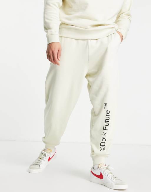 Asos Dark Future Co Ord Relaxed Joggers With Logo Print In Off White Asos