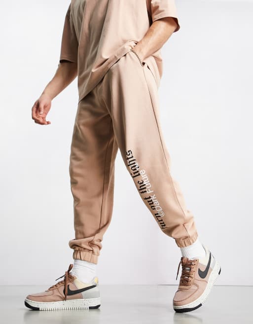 Asos Dark Future Co Ord Relaxed Joggers With Slogan And Logo Print In