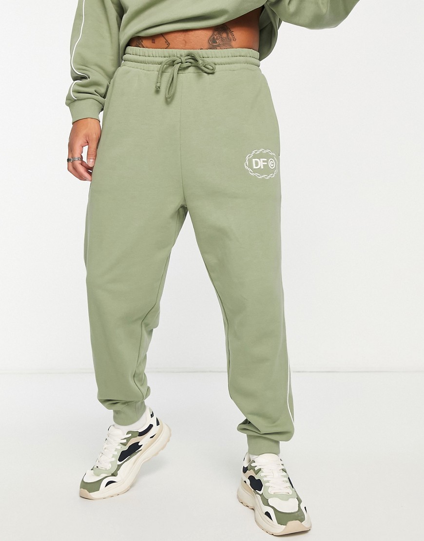 ASOS Dark Future co-ord relaxed joggers with v-neck and piping in khaki green