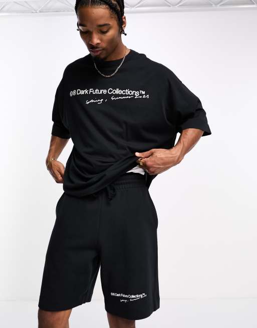 ASOS Dark future co-ord relaxed short with logo print in black
