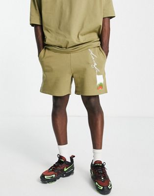 ASOS Dark Future co-ord relaxed shorts with graphic and logo print in khaki green - ASOS Price Checker