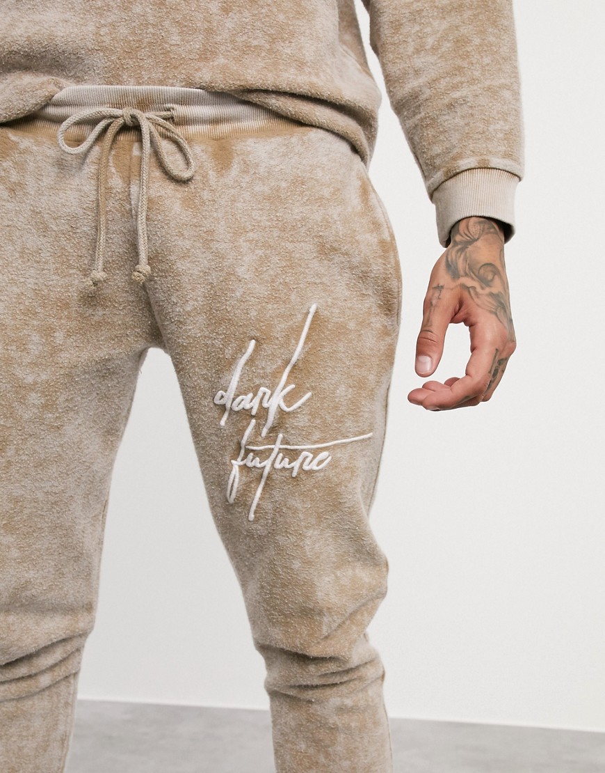 ASOS Dark Future co-ord skinny joggers in washed reverse polar fleece with logo-Beige