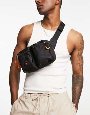 ASOS Dark Future fanny pack with double pocket and badge in black