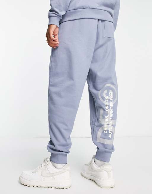 ASOS Dark Future - Jogger d'ensemble décontracté à logo - Bleu ardoise